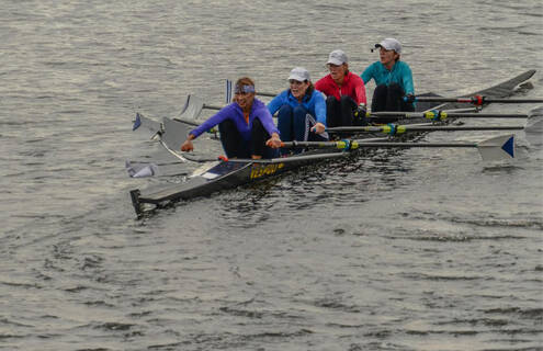 World champion rower Carin Reynolds with her crew team